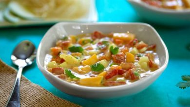 Photo of Soupe froide aux tomates et à la mangue et à la noix de coco