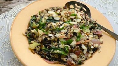 Photo of Pilaf de riz sauvage aux épinards et aux amandes