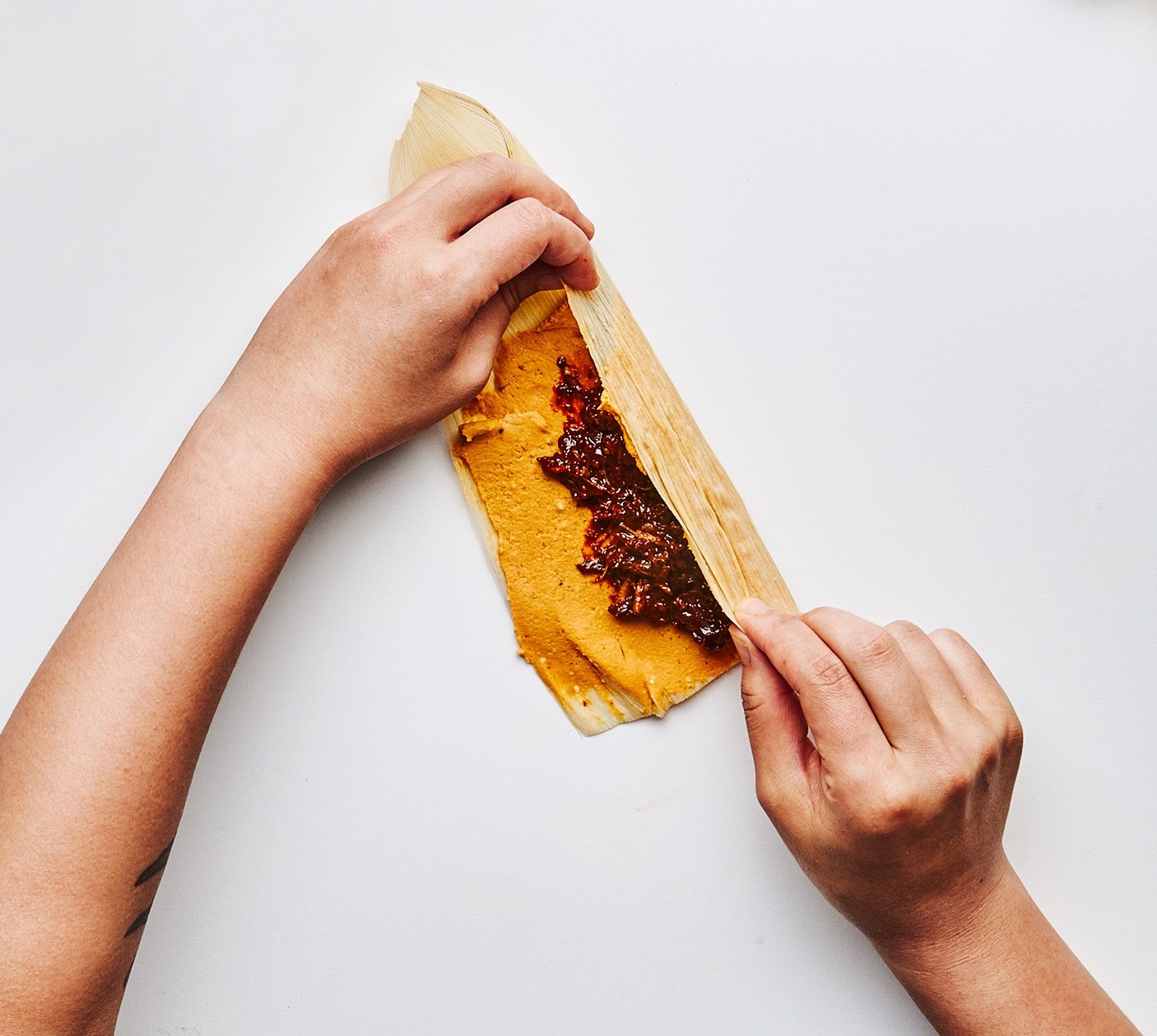 Cette image peut contenir de la nourriture humaine et un hot-dog